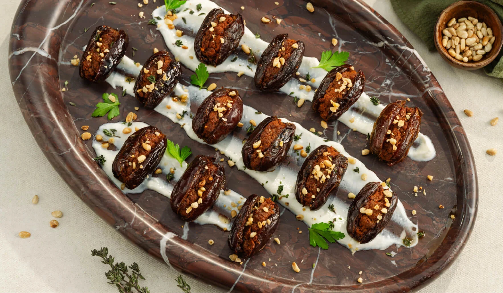 Spanish Chorizo-Stuffed Dates With Yogurt Sauce